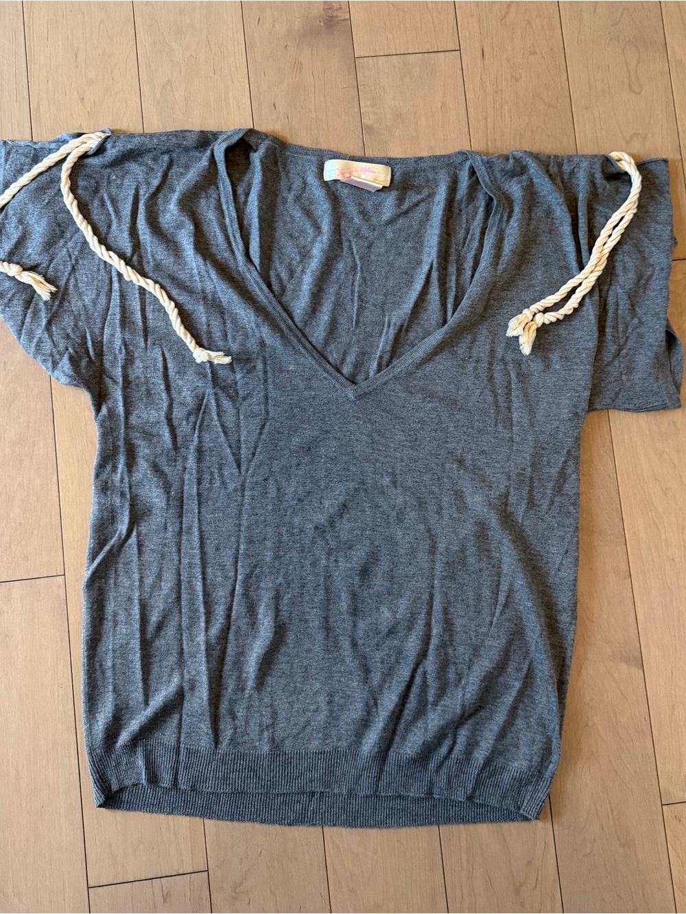 Short sleeve size L bamboo/cashmere blend knit top w/rope shoulder ties.